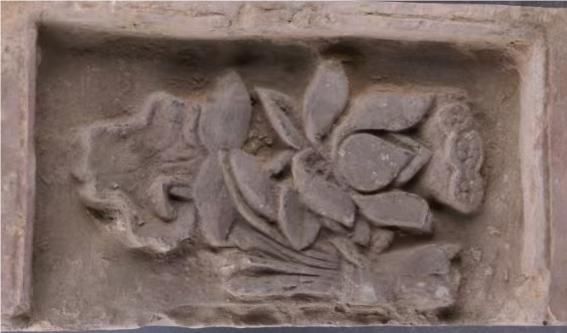 宋莲花纹画像砖（图片由延安市甘泉县文物保护中心提供）